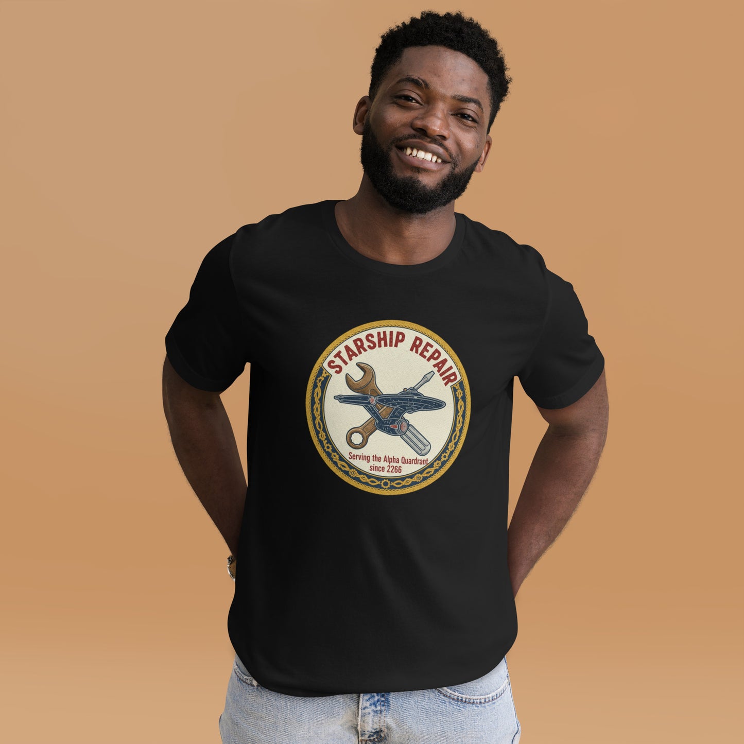 A man wearing the black Starfleet Engineering T-Shirt representing the Geek Dad Fashion Starship Repair theme.