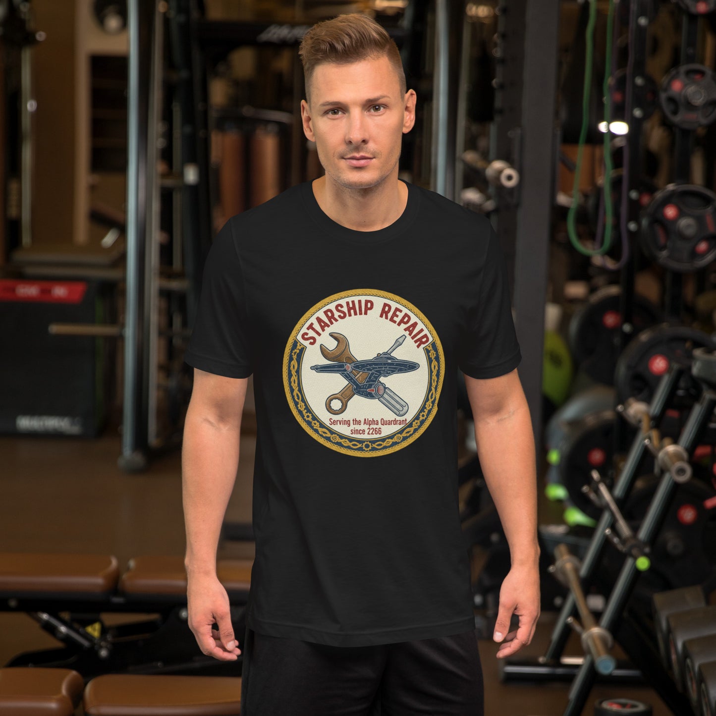 View of a man wearing the black Starfleet Engineering T-Shirt at the gym representing the Geek Dad Fashion Starship Repair theme.