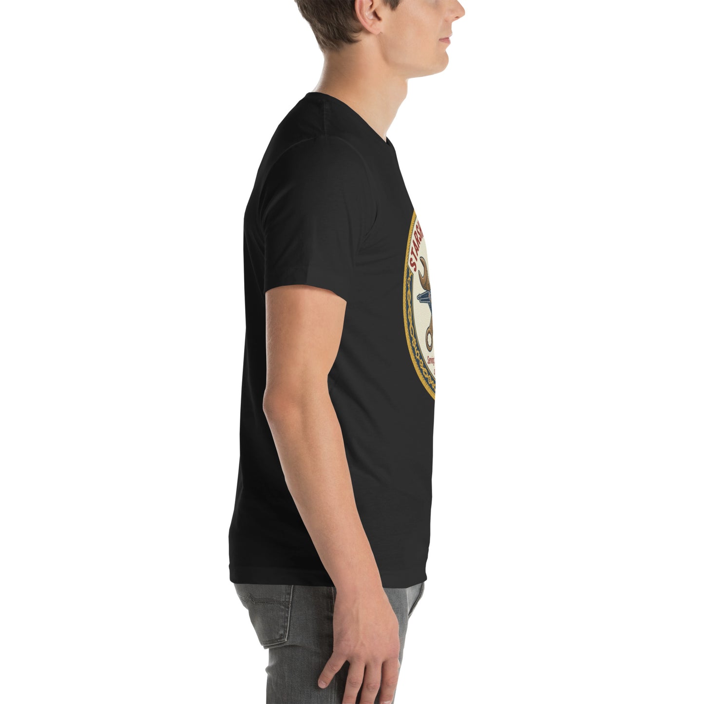 Side view of a man wearing the black Starfleet Engineering T-Shirt representing the Geek Dad Fashion Starship Repair theme.
