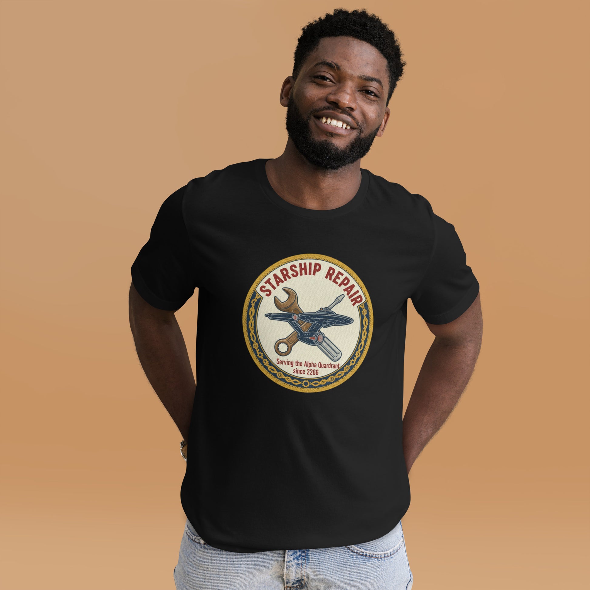 A man wearing the black Starfleet Engineering T-Shirt representing the Geek Dad Fashion Starship Repair theme.